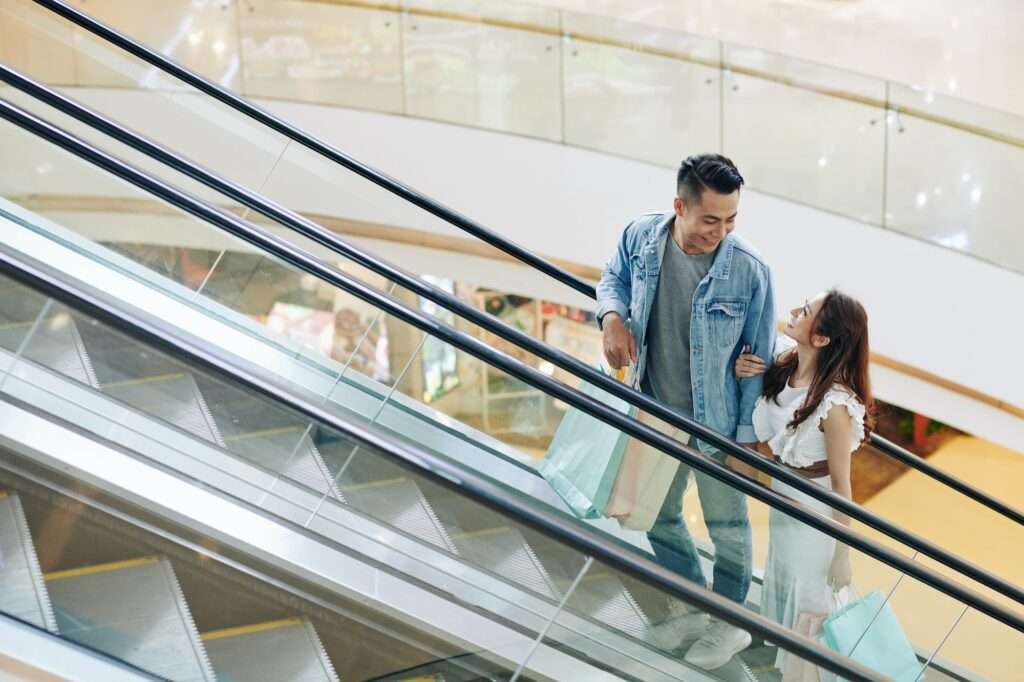Young couple on escalator